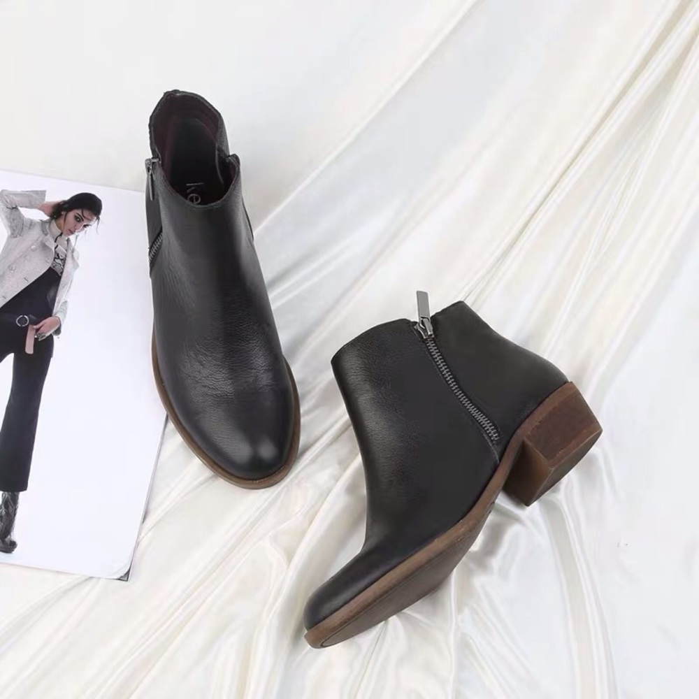 Gently used Kensie black leather boots